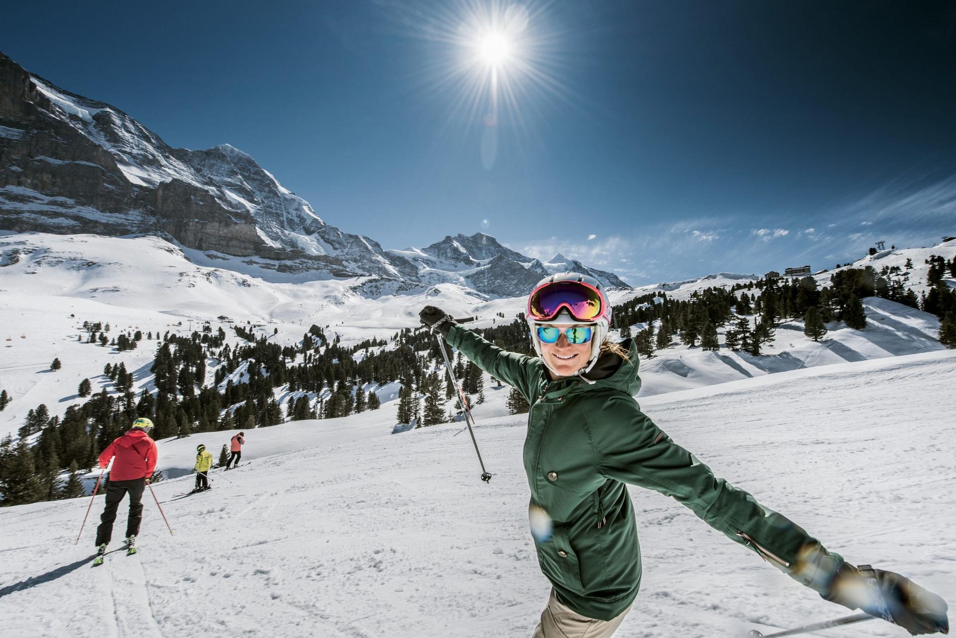 Smiling skier on the piste